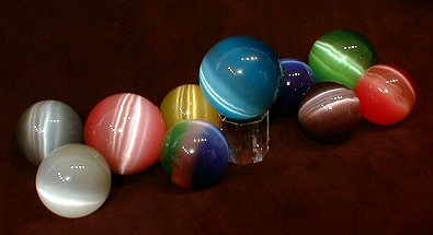 Small spheres measure about 1 inches in circumference, and the large spheres are about 1 inches. The optional stand allows the sphere to spin in place and is available alone or as a set.